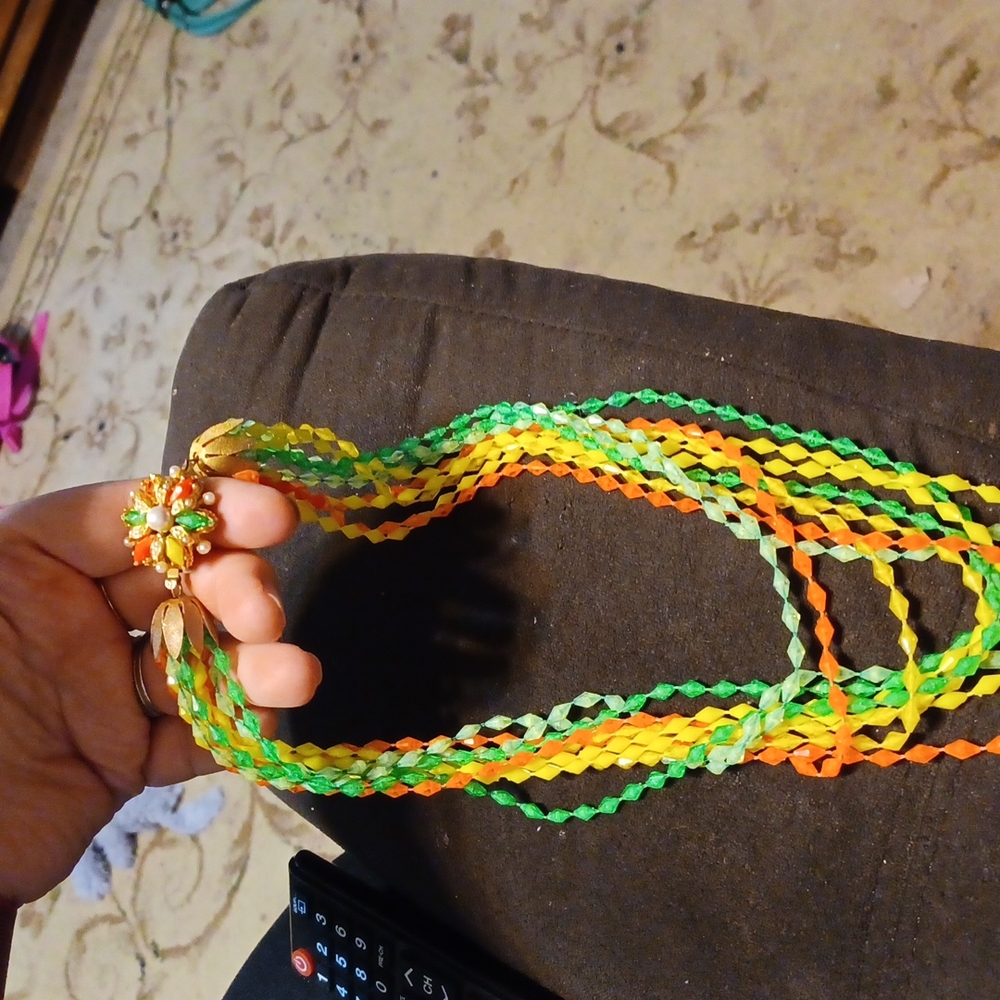Bright color knecklace not sure brand very well made